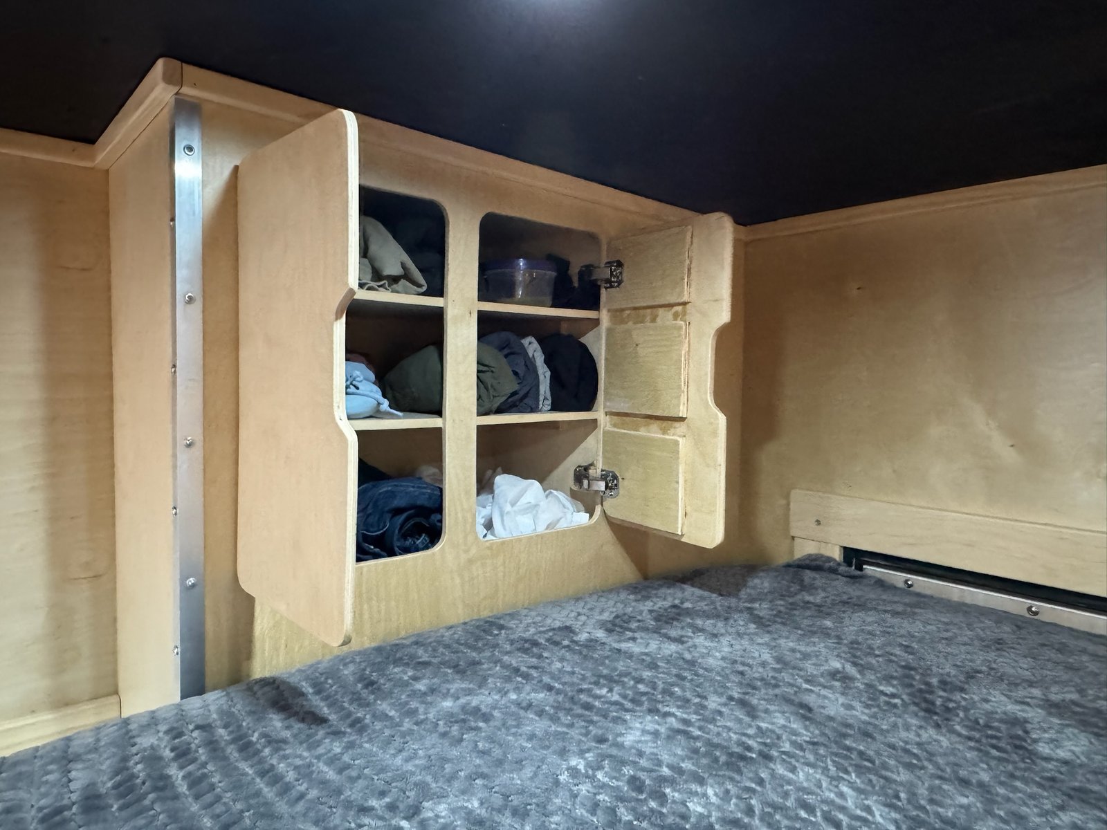 Built-in closet next to the bed