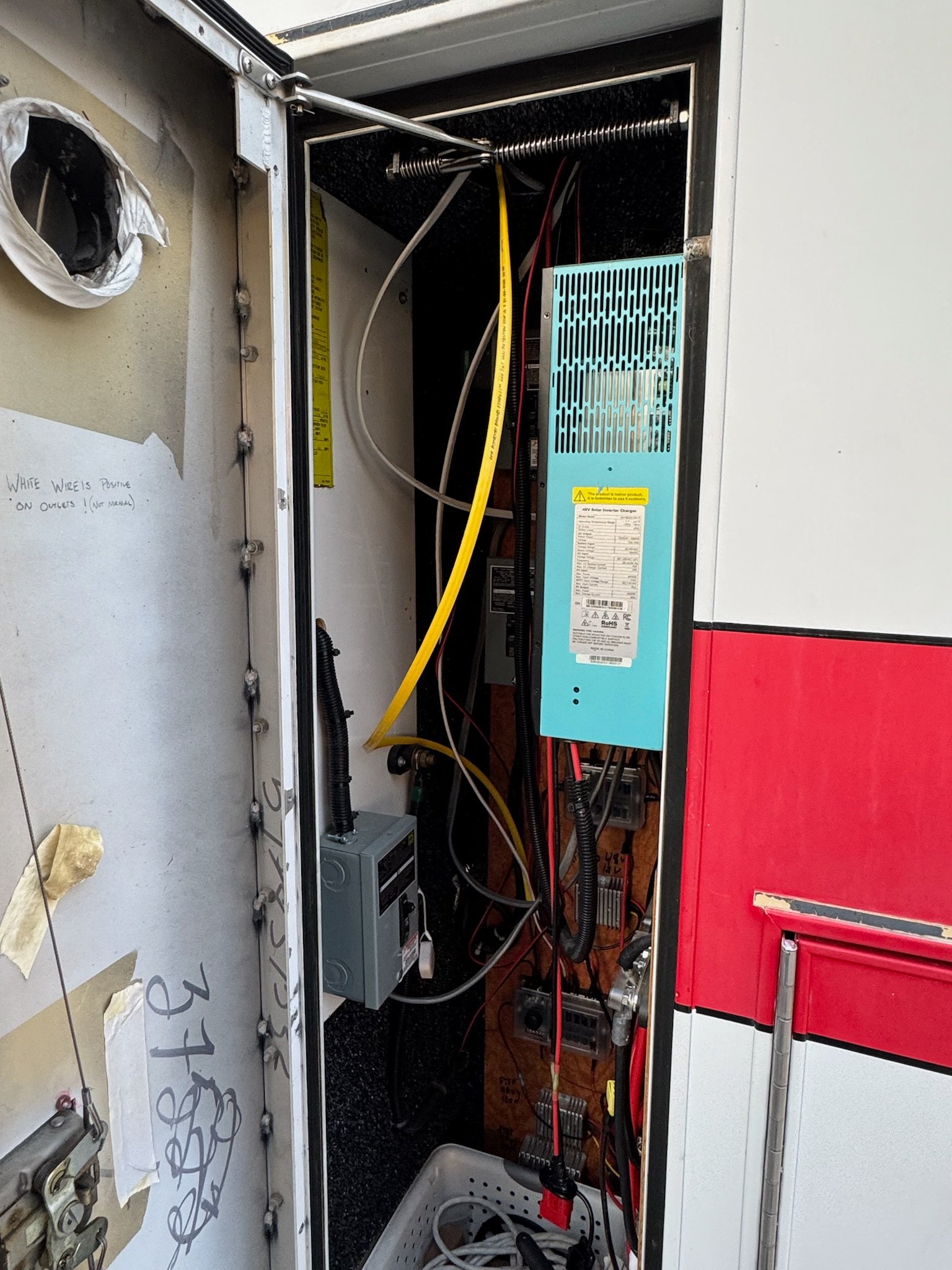 Electrical system wiring inside ambulance cabinet